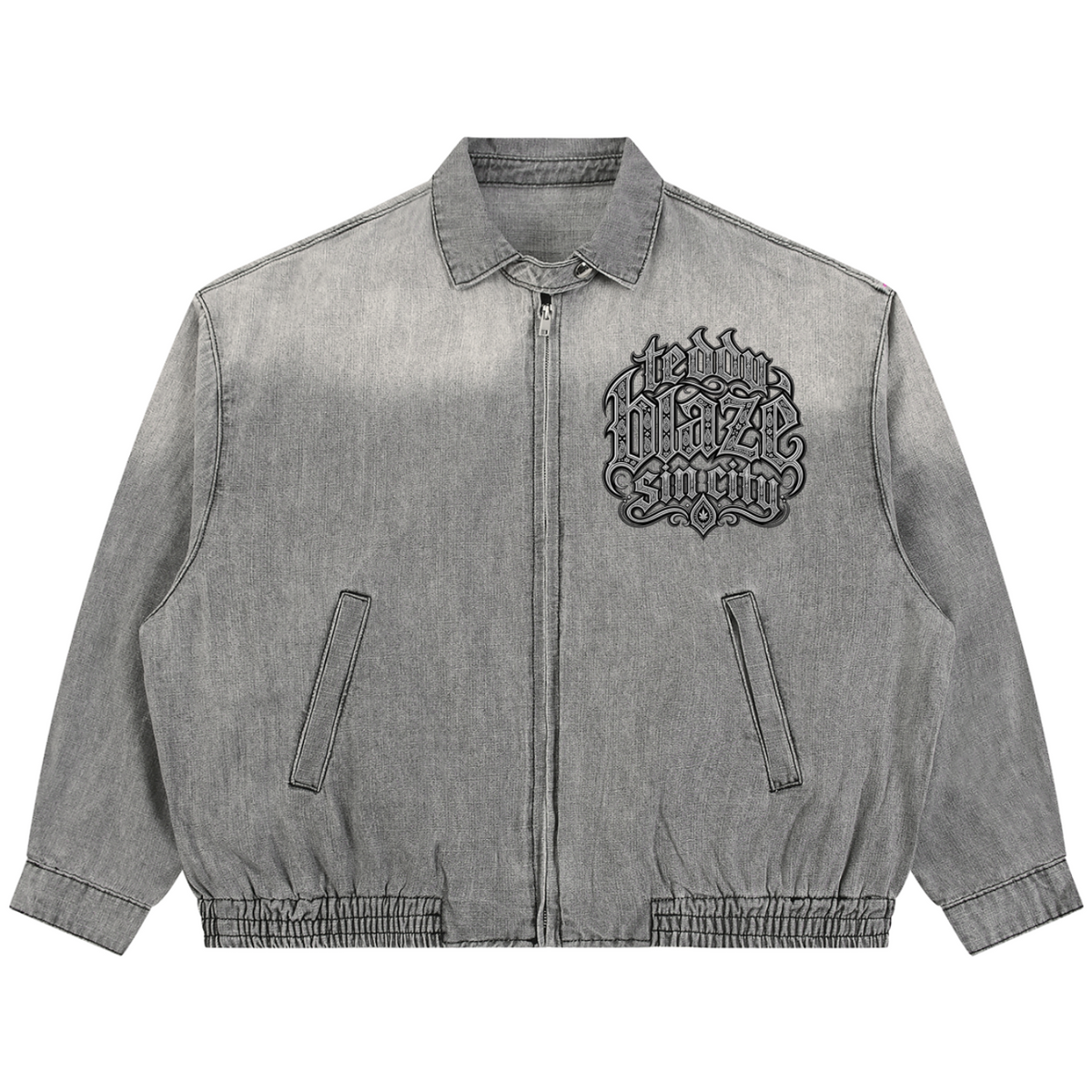 Elevate your transitional outerwear with the Teddy Blaze Sin City Vintage Wash Denim Jacket. Sun-washed gray denim, zip front, elastic hem, and filigree house back graphic. Shop NYC to Vegas style.