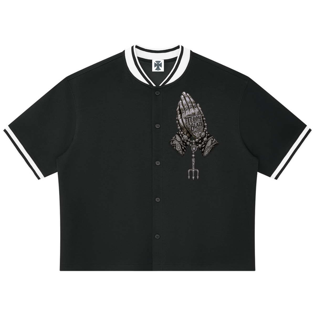 Elevate your sporty layers with the Teddy Blaze Sin City Sacred Baseball Jersey. Black stretch-cotton button-up jersey, contrast ribbed trim, and tattoo praying hands graphic. Shop NYC to Vegas style.