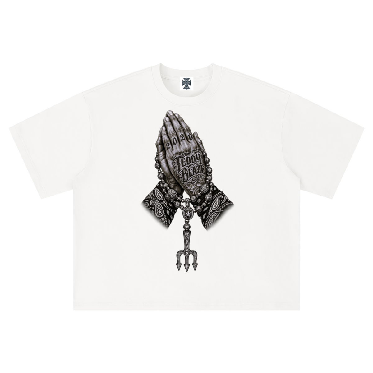 Elevate your streetwear with the Teddy Blaze Sin City Sacred Box Cut T-Shirt. Black stretch-cotton, tattoo praying hands print, and boxy cut. Shop NYC to Vegas style.