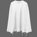 Shop the Slashed Hem Drop Shoulder Long Sleeve Tee by Teddy Blaze. Wrinkle-resistant combed cotton tee featuring raw distressed hem cutouts from THE IVY MAN.