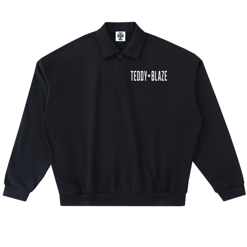 Elevate your athletic layering with the House of Teddy Blaze Statement Fleece Long Button Polo. Black 445 gsm fleece, lapel collar, button placket, and bold star block typography. Shop NYC to Vegas style.