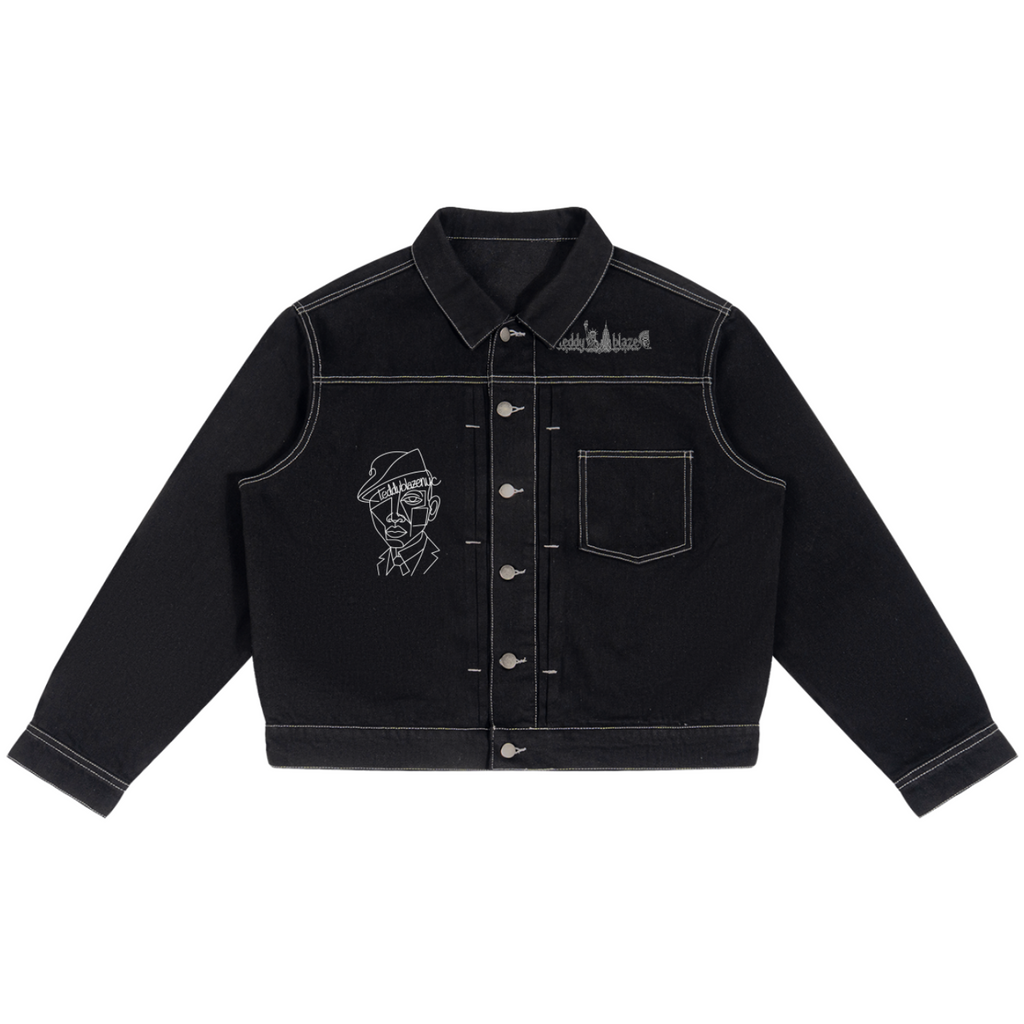 Elevate your luxury denim jacket lineup with the House of Teddy Blaze Afro Yorker Box Cut Denim Jacket. Heavyweight 428 gsm black cotton-poly denim jacket, contrast white stitching, Afro Yorker portrait, and NYC Statue of Liberty back emblem embroidery. Shop NYC to Vegas style