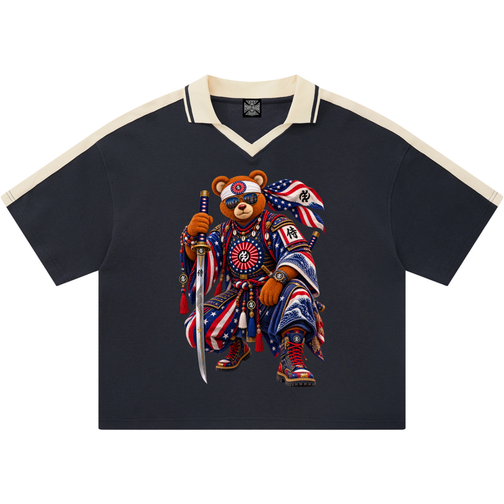 Discover the Teddy Blaze Brand Rising Contrast Polo, a heavyweight boxy polo featuring Teddy Blaze Samurai, Gye Nyame artwork and contrast trim.