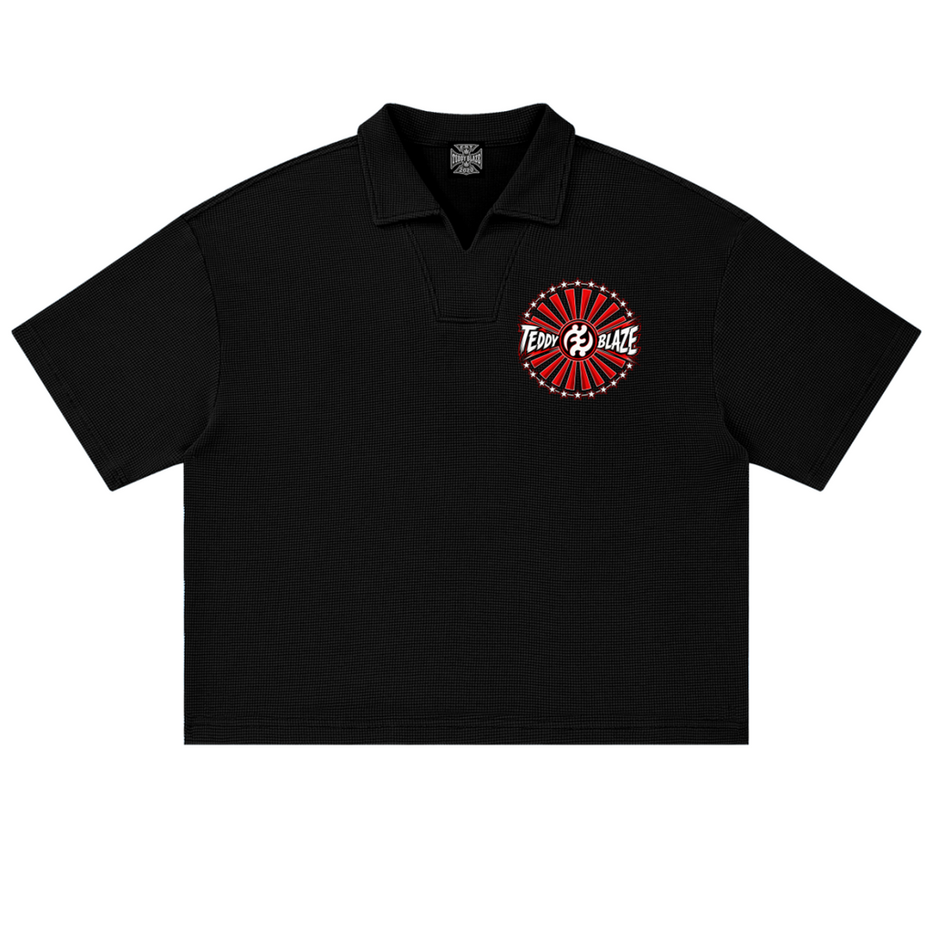Shop the Teddy Blaze Brand Rising Waffle Knit Boxy Polo with textured cotton-blend construction, Gye Nyame branding and bold Teddy Blaze Samurai artwork.