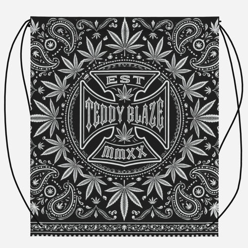 Lightweight black-and-white drawstring bag featuring the DaCruz Cross, TeddyFlora and paisley-inspired artwork by Teddy Blaze.