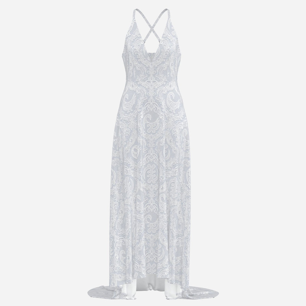 A statement Sankofa lace maxi dress featuring a deep V-neck, cross-back straps, and Teddy Blaze cultural textile design. Afrocentric luxury with modern fashion house energy.