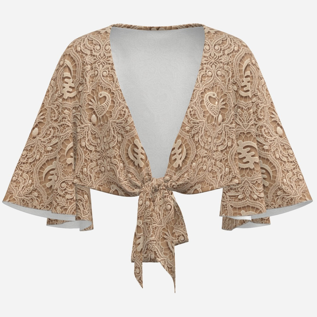 Earth-tone Teddy Blaze cropped wrap cover-up featuring trompe l'oeil lace, Sankofa motifs, flowing bat-wing sleeves and an adjustable tie front.