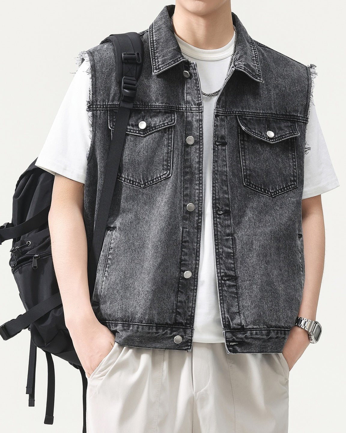 Shop the Urban Workwear Raw-Edge Denim Vest by Teddy Blaze. Loose fit cotton-blend utility vest featuring frayed armholes, multi-pocket storage, and turn-down collar.