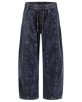 Shop the Iron + Ivy Washed Corduroy Spliced Loose Fit Drawstring Pants by Teddy Blaze. Relaxed-fit blue cotton-blend corduroy trousers featuring spliced detailing, stitched panels, and an adjustable tie closure.
