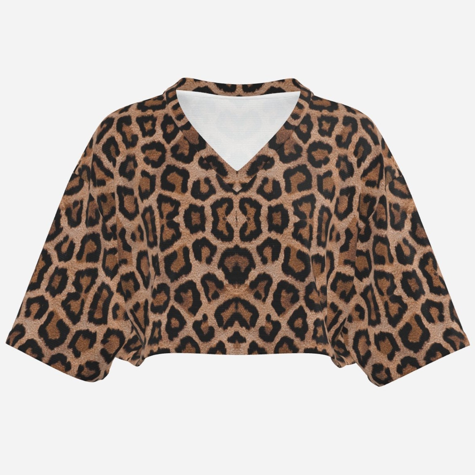 Shop the Zabu V-Neck Half Sleeve Crop Tee by Teddy Blaze. Silky-shine boxy crop top featuring an all-over leopard motif from THE IVY WOMAN collection.